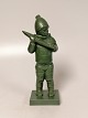 Ipsen ceramic 
green glazed 
figure "Eskimo" 
Artist Svend 
Jespersen nr. 
918 Height 
21cm.