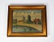 Oilpainting 
with country 
village motif 
and gilded 
frame, signed 
Erskov 16.
65 x 80 x 8 
cm.