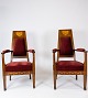 Set of two 
armchairs of 
walnut with 
inlaid wood and 
upholstered 
with red velvet 
from around ...