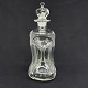 Height 25.5 cm.
Kluk flask in 
clear glass 
with crown 
stopper from 
Holmegaard.
The flask is 
...