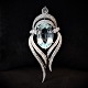 A pendant set 
with a big 
Aquamarine, two 
brillants and 
63 diamonds. 
Aquamarine 
around 19,5 ct. 
...