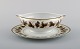 Limoges sauce 
boat on stand 
in porcelain 
with 
hand-painted 
grape vines and 
gold 
decoration. ...