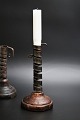 French 1800 century candlestick in twisted wrought iron with wooden base and very fine patina. ...