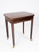 Side table of 
mahogany with 
inlaid wood and 
on wheels from 
the 1890s. The 
table is in 
great ...