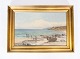 Oil painting 
with beach 
motif and 
gilded frame, 
signed A. T. 
1947. 
36 x 50 cm.