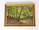Oil painting 
with motif of a 
forrest in the 
spring, with 
gilded frame 
and unknown 
signature from 
...