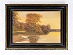 Oil painting 
with nature 
motif and black 
painted frame 
from the 1930s. 

56 x 76 cm.