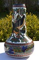 Annaburg 
stoneware 
1895-1945 Large 
hand-painted 
vase decorated 
with birds and 
flower petals, 
...