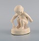 Adda Bonfils (1883-1943) for Ipsens Enke. Figure of girl with shovel in glazed 
ceramics. Model number 889. 1920s / 30