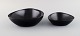 Kockum, Sweden. 
Two bowls in 
black enamel. 
1970s.
Largest 
measures: 21 x 
6.5 cm.
In excellent 
...