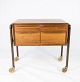 This small 
chest of 
drawers on 
wheels in 
rosewood, 
designed by 
Danish 
craftsmen in 
the 1960s, ...