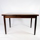Dining table in rosewood with extentions, of danish design from the 1960s. 
5000m2 showroom.