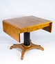 Dining table 
with extentions 
of polished 
birch wood, in 
great antique 
condition from 
the 1840s. ...