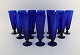 Monica Bratt 
for Reijmyre. 
15 champagne 
flutes in blue 
mouth blown art 
glass. 1950s.
Measures: ...