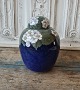 Royal 
Copenhagen Art 
Nouveau vase 
decorated with 
strawberry 
flowers, 
strawberry 
leaves on a 
blue ...
