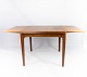 Dining table 
with extentions 
in teak 
designed by 
Henning 
Kjærnulf from 
the 1960s.  The 
table is ...