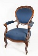 Antique 
armchair of 
mahogany and 
upholstered 
with blue 
fabric from 
1880. The chair 
is in great ...