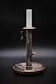 French 1800 century chamber candlestick in metal with a super nice patina. H:19cm.