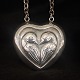 Henry Heerup; A 
necklace of 
sterling 
silver, set 
with a big 
heart shaped 
pendant, 5,2 x 
5,2 cm. ...