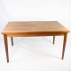 Dining table in 
teak with 
extension 
plates, 
designed by 
Henning 
Kjærnulf from 
the 1960s. The 
...