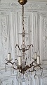 Very beautiful 
5-armed 
chandelier hung 
with numerous 
large crystals.
Diameter 46 
cm. Height 90 
cm.