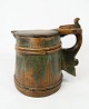 Antique jug of 
dark wood with 
original 
colours and in 
great vintage 
condition from 
1860.  
23 x ...
