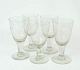 Set of five 
Egeløv wine 
glass by 
Holmegaard, in 
great antique 
condition from 
1860. 
16 x 7 cm.