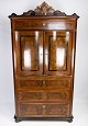 This secretary 
from the 1880s 
is a 
masterpiece of 
craftsmanship 
and elegance. 
Crafted from 
...