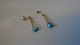 Elegant 
earrings with 
turquoise 8 
carat gold
Stamped 8 k
Nice and well 
maintained 
condition