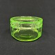 Diameter 11 cm.Beautiful uran green butter jar from Holmegaard Glasværk.It appears in the ...