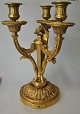 French bronze candlestick, Louis XVI style, approx. 1900. With three light arms. In the foot ...