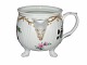 Royal 
Copenhagen 
creamer with 
gold and 
flowers. The 
lid is missing.
This product 
is only at ...