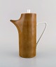 Kenji Fujita 
for Tackett 
Associates. 
Modernist 
coffee pot in 
porcelain. 
Dated ...
