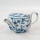 Tea cup of 
German 
porcelain 
decorated with 
blue pattern.
6 x 8 cm.