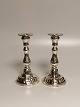A pair of 830 
silver table 
tops with loose 
cuffs Sweden 
Height 18cm.