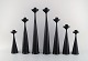 A collection of 
seven 
Scandinavian 
designer 
candlesticks in 
wood and brass. 
Modernist and 
clean ...