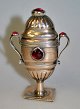 Vase-shaped 
Louis XVI 
vinagrette egg 
in silver with 
red glass, 
1857, Niels 
Schouw Svendsen 
(c. ...
