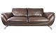 This large 2-seater sofa is upholstered in brown leather and has a metal frame that gives it a ...