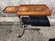 Small office 
table in teak 
and metal, can 
be raised and 
lowered as well 
as tilting the 
large ...