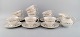 Royal Doulton, 
England. Twelve 
Fairfax teacups 
with saucers 
and a cream jug 
in porcelain 
with ...