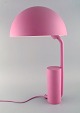 KaschKasch for 
Normann 
Copenhagen. Cap 
table lamp in 
pink lacquered 
steel with 
adjustable ...