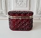 Candy box in 
ruby red 
pressed glass 
Measurements 
9.5 x 13.5 cm. 
Height 9 cm.