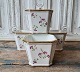 Set of 4 
antique B&G 
flower pot 
decorated with 
gold edges and 
purple flowers. 

Measures 11 x 
11 ...