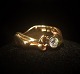 Danish brillant 
jewellery. 
Carat Design 
Aalborg; A 14 
kt. gold ring 
with a 
brillant, app. 
0,5o ...