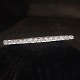 Diamond 
jewellery.
A art deco 
gold and silver 
brooch set with 
diamonds. 
Brooch from 
around ...
