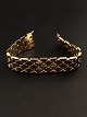 14 carat gold 
vintage 
bracelet 18.5 
cm. B. 1.7 cm. 
V. 35.5 gr. 
From jeweler 
Willy Junget 
...