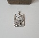 Pendant in 
silver 
Stamped: CAC - 
830s
Measure 3 x 5 
cm.