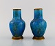 Paul Milet (1870-1930) for Sevres, France. Two vases in glazed ceramics with 
brass mounts. Beautiful glaze in light blue shades. 1920s.
