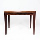 Side table in 
rosewood 
designed by 
Henning 
Kjærnulf and 
manufactured by 
Vejle Furniture 
in the ...
