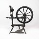 Antique spinning wheel of polished wood from around the year 1880.
5000m2 showroomm.